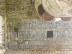 Sky goddess Nut gives birth to the sundisk through her moutht